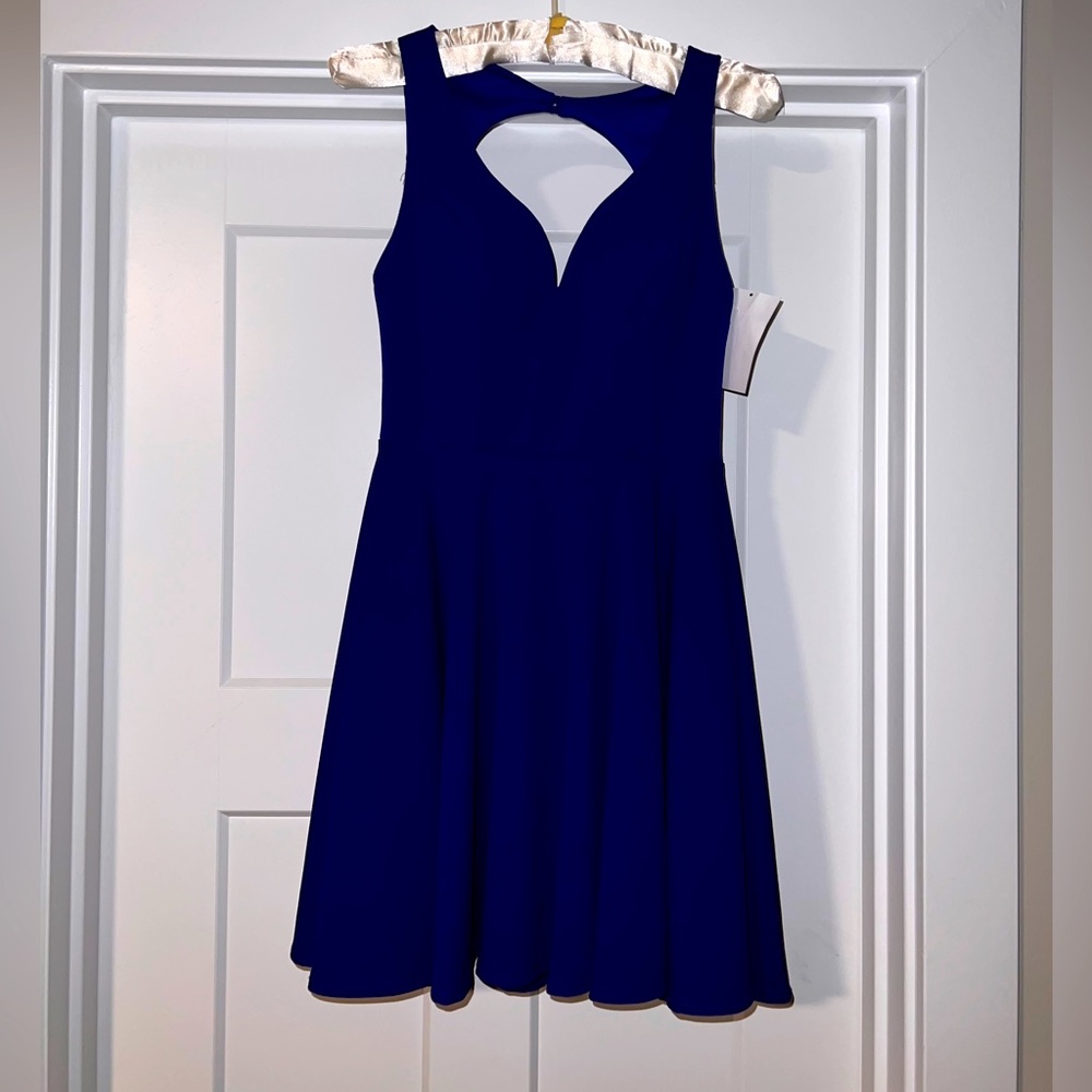 NWT. Royal blue Semi Casual cocktail dress. Size 1/2